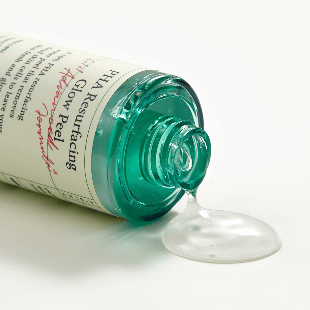 Una botella AXIS - Y PHA Resurfacing Glow Peel 50ml sobre una superficie lisa.