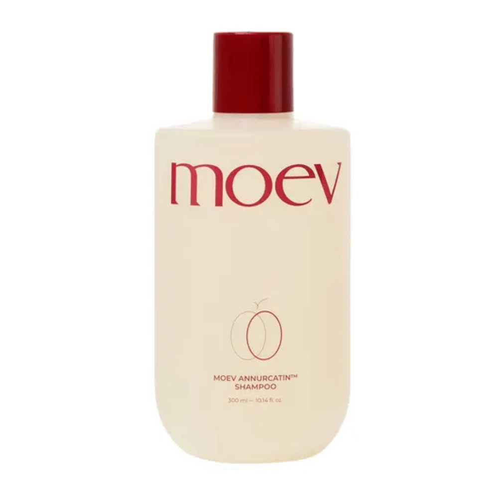 MOEV Annurcatin Shampoo 300 ml – un champú vegano y nutritivo enriquecido con manzana Annurca, biotina y cafeína que fortalece el cabello y promueve un cuero cabelludo saludable.
