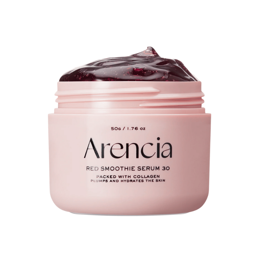 Primer plano de Arencia Red Smoothie Serum 30 en tarro rosa, lleno de gel rojo profundo para hidratación y firmeza.