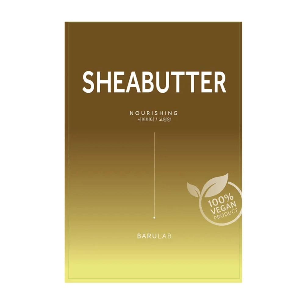 Un paquete de la máscara "SHEABUTTER Nourishing" BARULAB, etiquetado como "100% Vegan Product". El paquete tiene un degradado de color que va de un dorado oscuro en la parte superior a un amarillo claro en la parte inferior.
