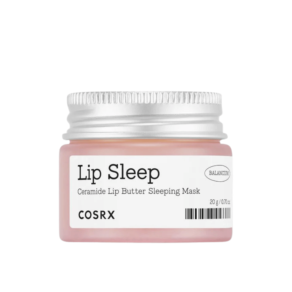 COSRX Lip Sleep Ceramide Lip Butter Sleeping Mask en frasco rosa con tapa plateada. Una mascarilla nocturna sin fragancia, nutritiva para labios suaves e hidratados.
