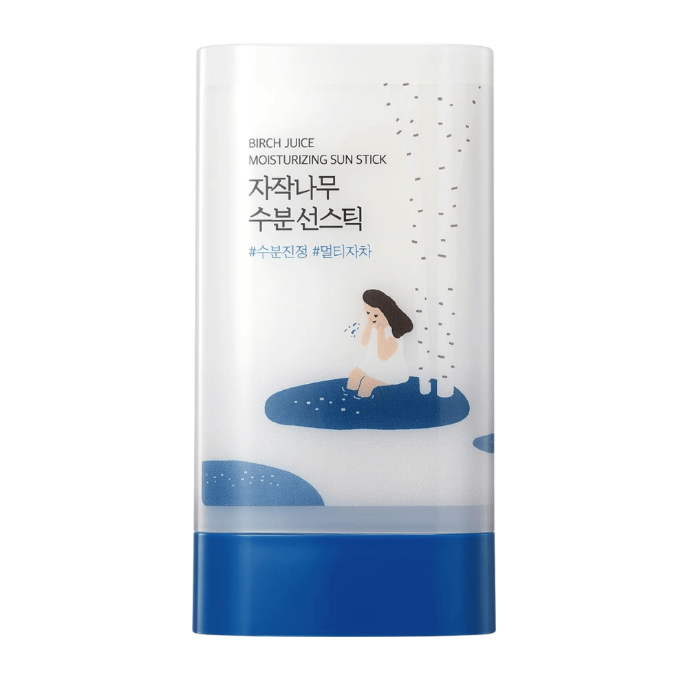 Primer plano de ROUND LAB Birch Juice Moisturizing Sun Stick con diseño y envase en blanco y azul