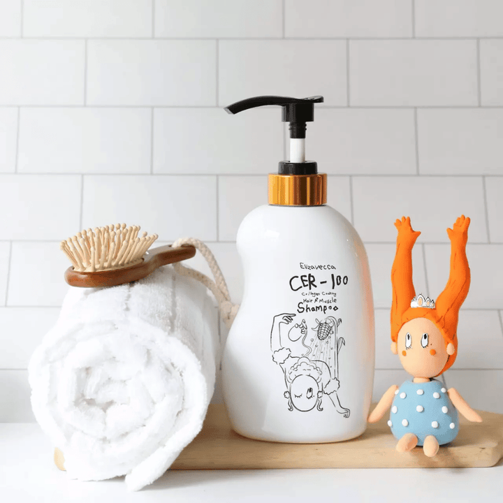 Elizavecca CER-100 Collagen Coating Hair A+ Muscle Shampoo – champú fortalecedor de colágeno para cabello seco y dañado en ambiente de baño