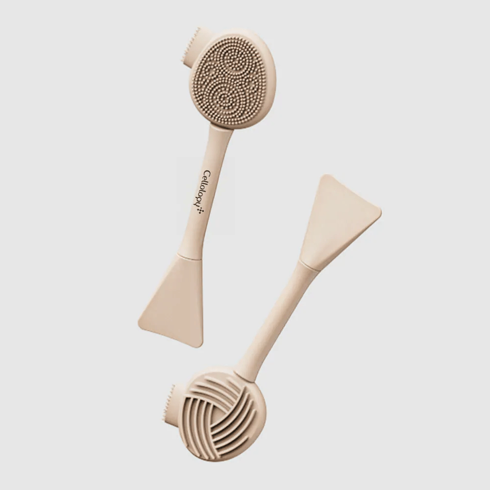 2. Cellolopy Cleaning Brush – anverso y reverso de un cepillo limpiador multifuncional con cerdas de silicona, superficie estriada y espátula