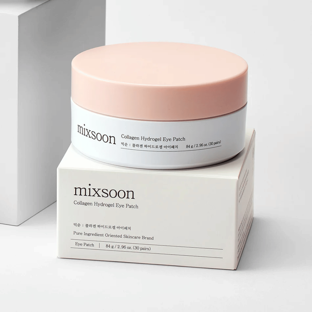 Imagen de Mixsoon Collagen Hydrogel Eye Patch. El frasco es rosa y blanco y contiene 84 g de parches para ojos con colágeno. Está sobre una caja blanca con texto que describe el producto y su contenido. El diseño es elegante y moderno, perfecto para el cuidado de los ojos.