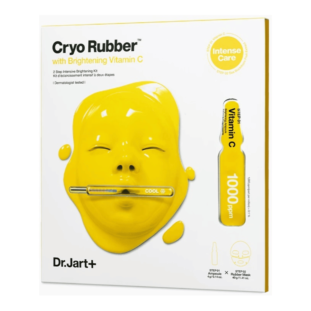 Dr.Jart+ producto de belleza llamado 'Cryo Rubber™ con Vitamina C Iluminadora'. El empaque muestra una mascarilla facial amarilla goteando con líquido. Se menciona que es un 'KIT intensivo de 2 pasos para iluminar' y que está 'dermatológicamente probado'. Ilustración de 'Vitamina C 1000ppm' se encuentra a la derecha.