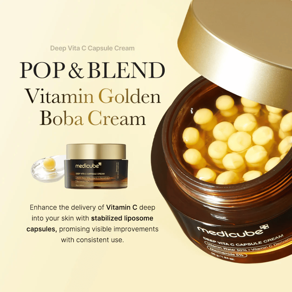 El empaque de "Medicube Deep Vita C Capsule Cream", una crema enriquecida con vitamina C que contiene cápsulas de liposomas estabilizados para penetrar eficazmente en la piel. El texto "POP & BLEND Vitamin Golden Boba Cream" enfatiza las características del producto, y la presentación visual muestra las cápsulas que prometen mejoras visibles con el uso continuo.