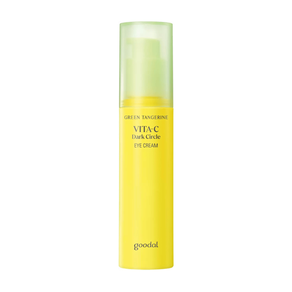 Una botella Goodal Green Tangerine Vita C Dark Circle Eye Cream 30ml sobre un fondo blanco con vitamina C.