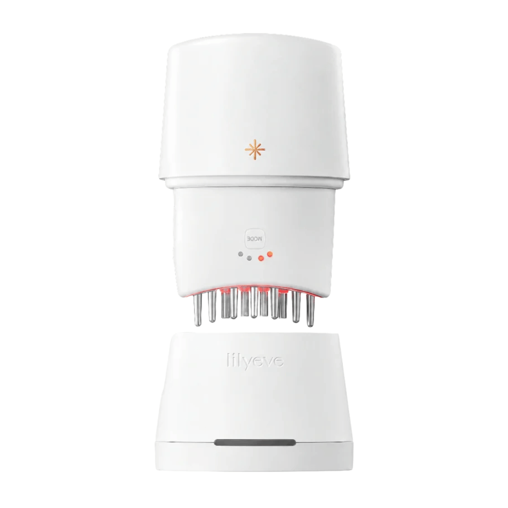 5. Lilyeve GrowTurn Pro – dispositivo blanco para el cuero cabelludo con luz LED roja y estación de carga correspondiente