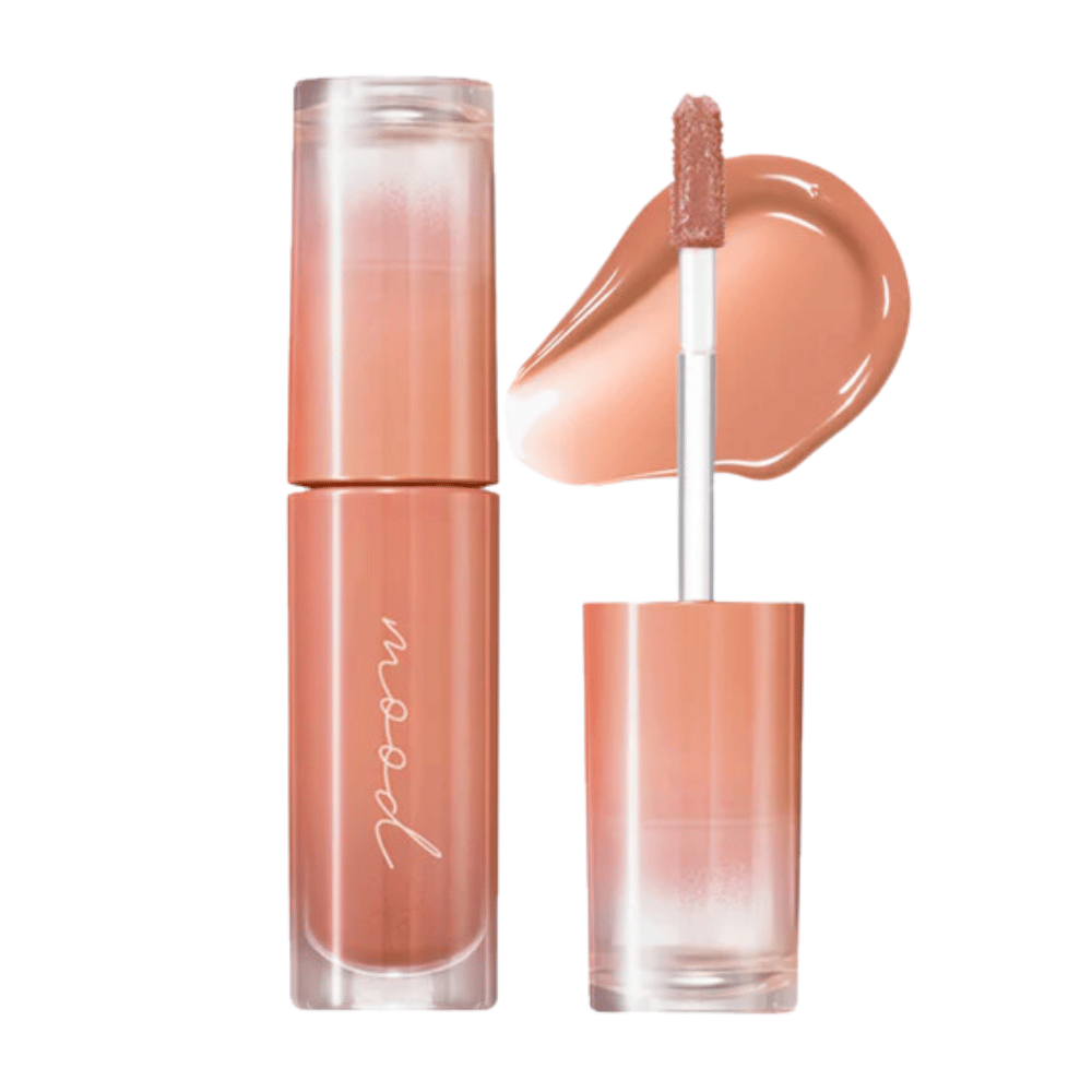 Ink Mood Glowy Tint es un brillo labial con una fórmula ligera y brillante que da un color y brillo natural a los labios. Perfecto para crear un look fresco y radiante. Disponible en varios tonos.