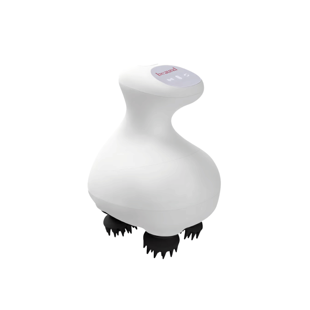 Beaund Lift Head Spa en uso sobre el cuero cabelludo. La imagen muestra cómo los cabezales de masaje giratorios trabajan cerca de las raíces del cabello para un masaje del cuero cabelludo relajante y revitalizante.