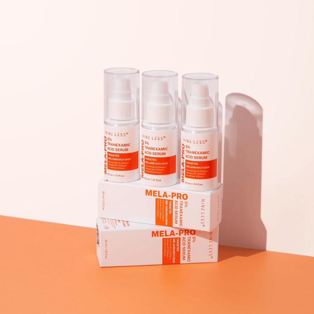 Tres NINE LESS MELA-PRO 5% Tranexamic Acid Serum 30 ml, suero iluminador con niacinamida y glutatión para piel rica en melanina.