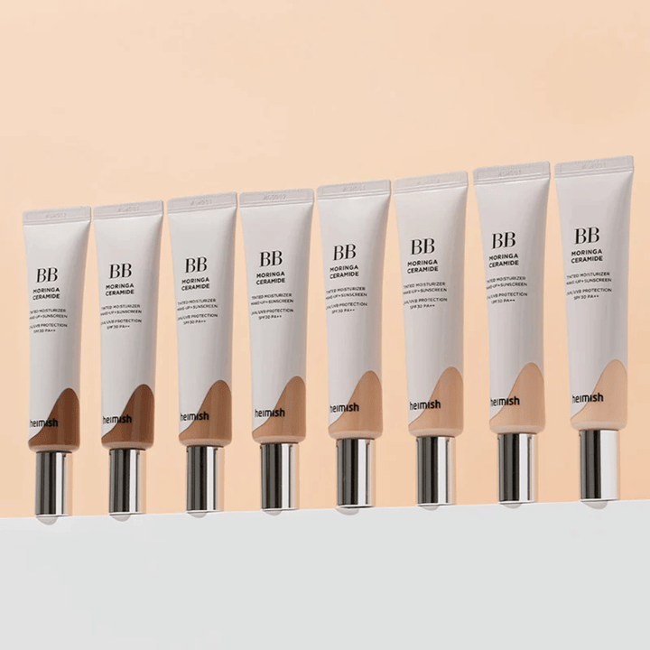 Fila de Heimish Moringa Ceramide BB Cream en varios tonos de color. La imagen ilustra la variación desde tonos más claros hasta más oscuros para adaptarse a diferentes tonos de piel y necesidades.