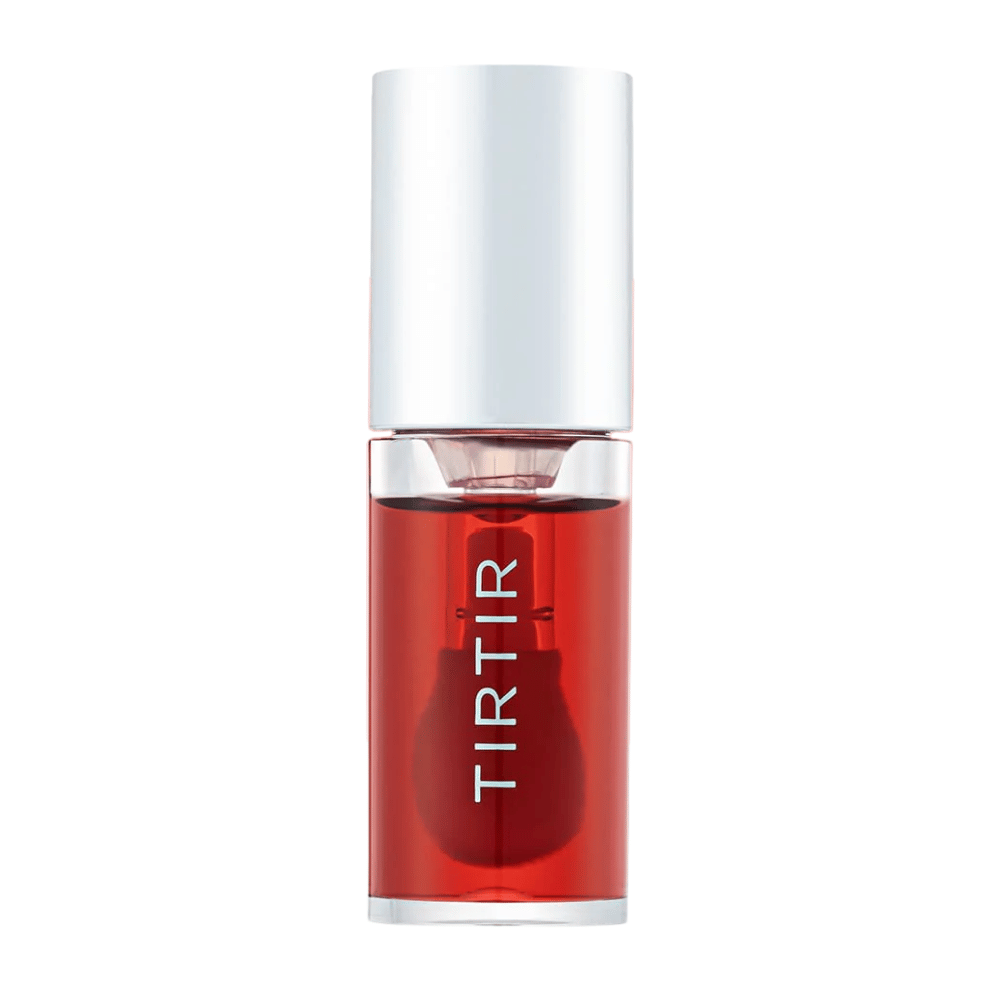 TIRTIR My Glow Lip Oil en tono rojo transparente con tapa plateada, mostrada de frente sobre fondo blanco.