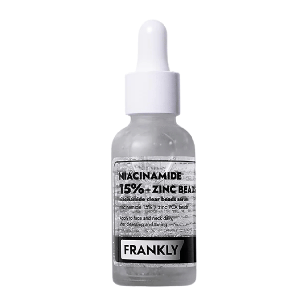 Imagen del producto de FRANKLY Niacinamide 15% + Zinc Beads Serum en botella de vidrio con pipeta. Un suero que equilibra, calma y mejora la claridad de la piel.