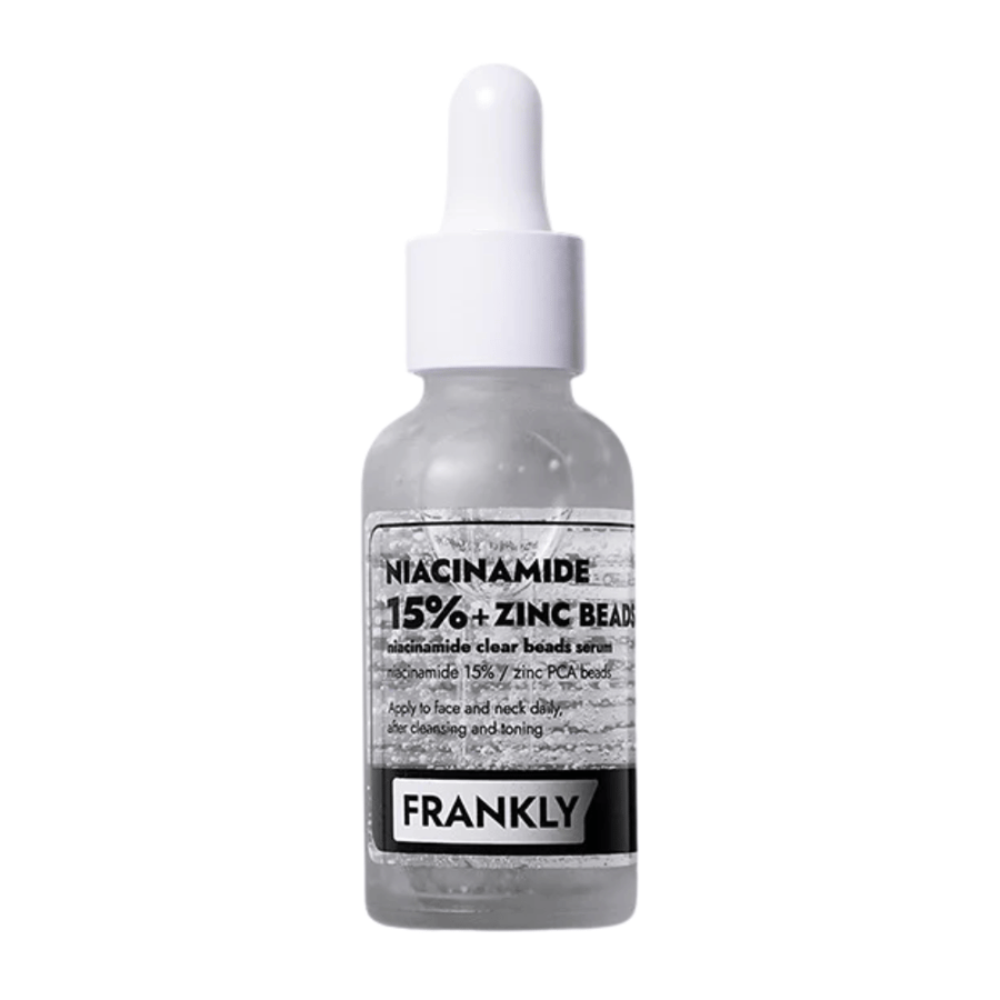 Produktbild av FRANKLY Niacinamide 15% + Zinc Beads Serum i glasflaska med pipett. Ett serum som balanserar, lugnar och förbättrar hudens klarhet.