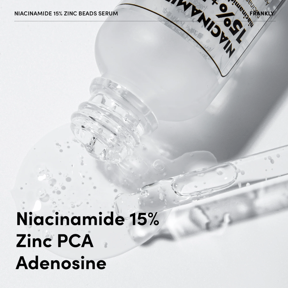 Primer plano de FRANKLY Niacinamide 15% + Zinc Beads Serum siendo vertido. El texto muestra ingredientes: Niacinamida 15 %, Zinc PCA y Adenosina.