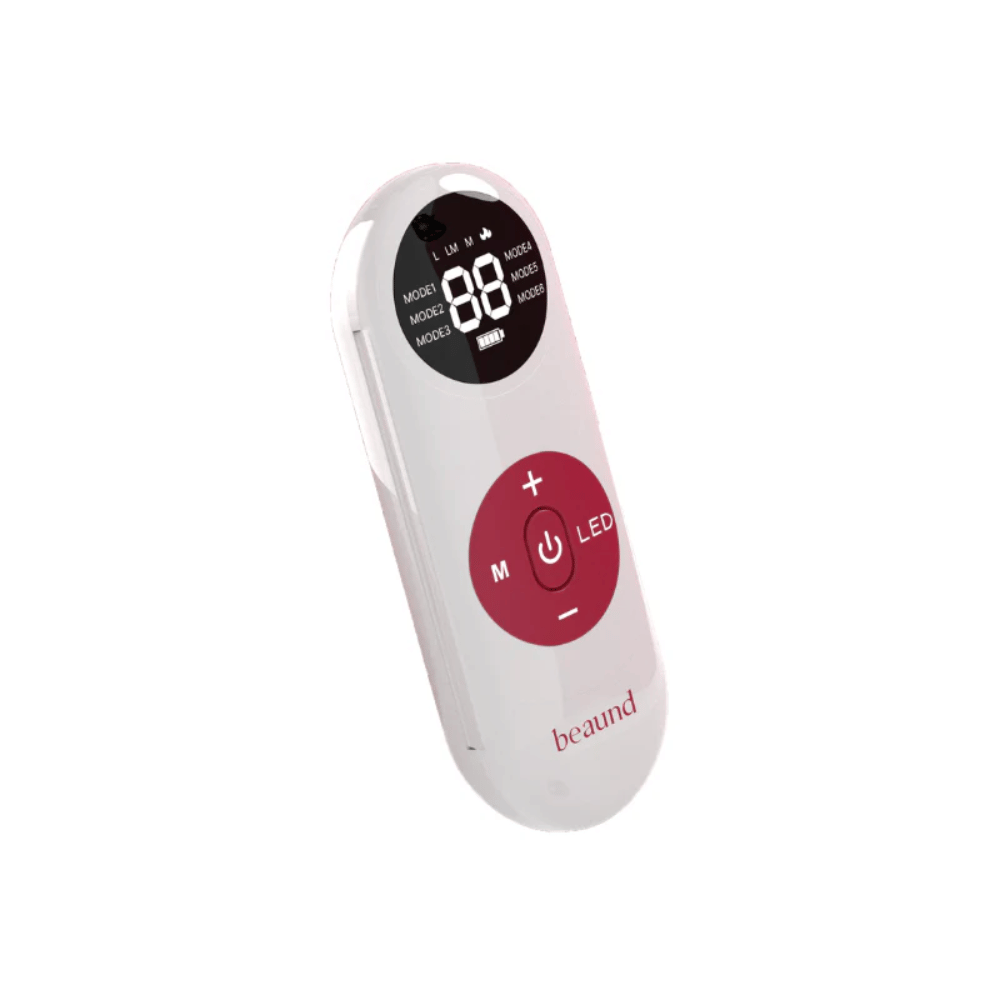 Primer plano del control remoto inalámbrico de Beaund Nmode Pro. La pantalla digital muestra el modo de tratamiento, el nivel de intensidad y el estado de la batería para un control sencillo.