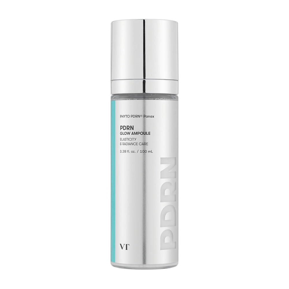VT PDRN Glow Ampoule en un frasco plateado con bomba, marcado indicando un contenido de 100 ml. El producto está diseñado para elasticidad y piel radiante, con el texto "PHYTO PDRN® Panax" y "Elasticity & Radiance Care".