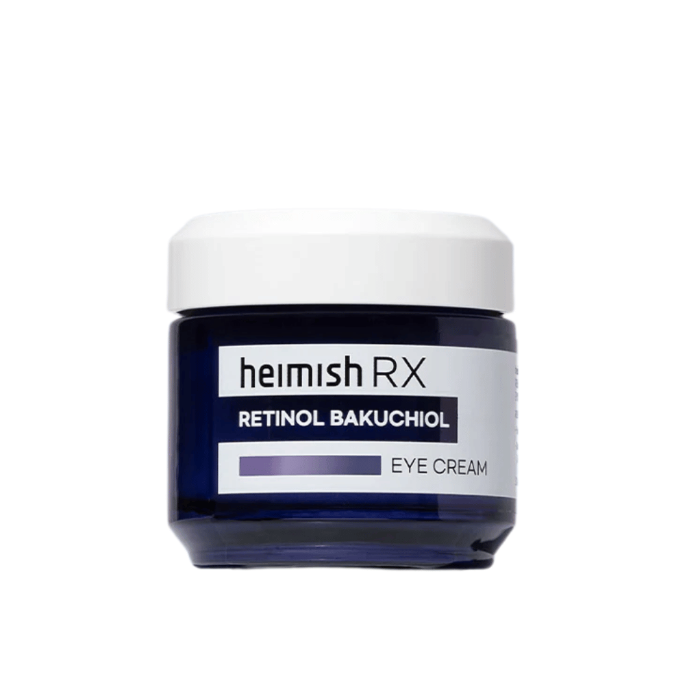 Heimish RX Retinol Bakuchiol Eye Cream en un frasco azul oscuro con tapa blanca. Una crema para ojos enriquecida con retinol y bakuchiol para una piel más lisa y firme alrededor de los ojos.