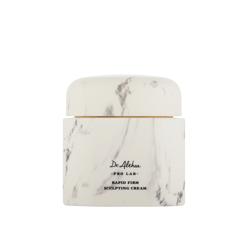 Dr. Althea Pro Lab Rapid Firm Sculpting Cream en un tarro de mármol elegante. Una lujosa crema facial que reafirma e hidrata la piel, enfocándose en proporcionar elevación y soporte para un brillo juvenil.