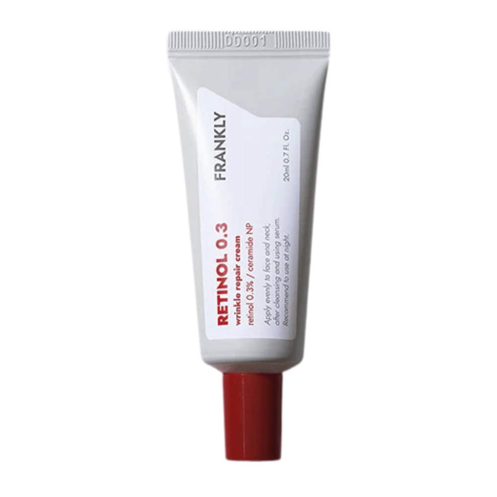 FRANKLY Retinol 0.3 Cream en tubo blanco con tapa roja. Una crema anti-envejecimiento con 0,3 % de retinol y ceramida NP para una piel más firme y uniforme.