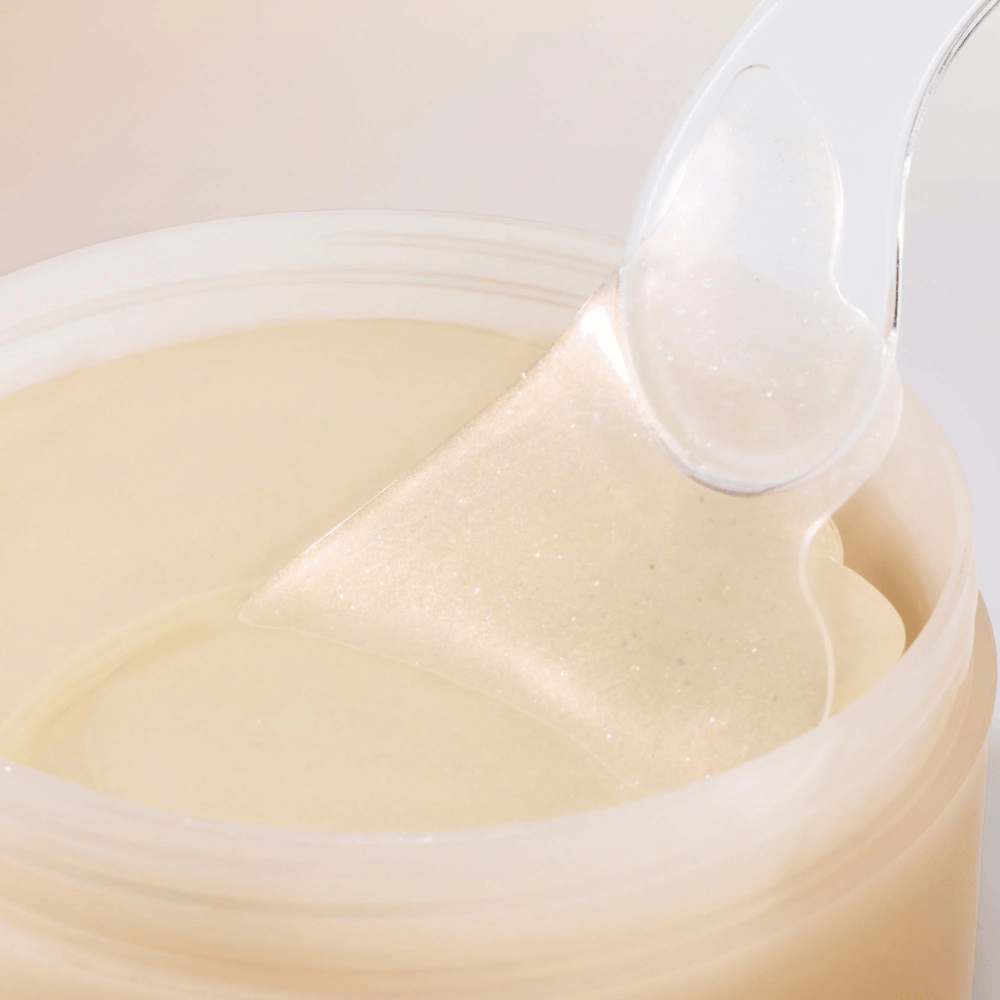 Espátula levantando Beauty of Joseon parche para ojos del tarro, parches de hidrogel con ginseng y retinal para anti-edad y cuidado de ojos.