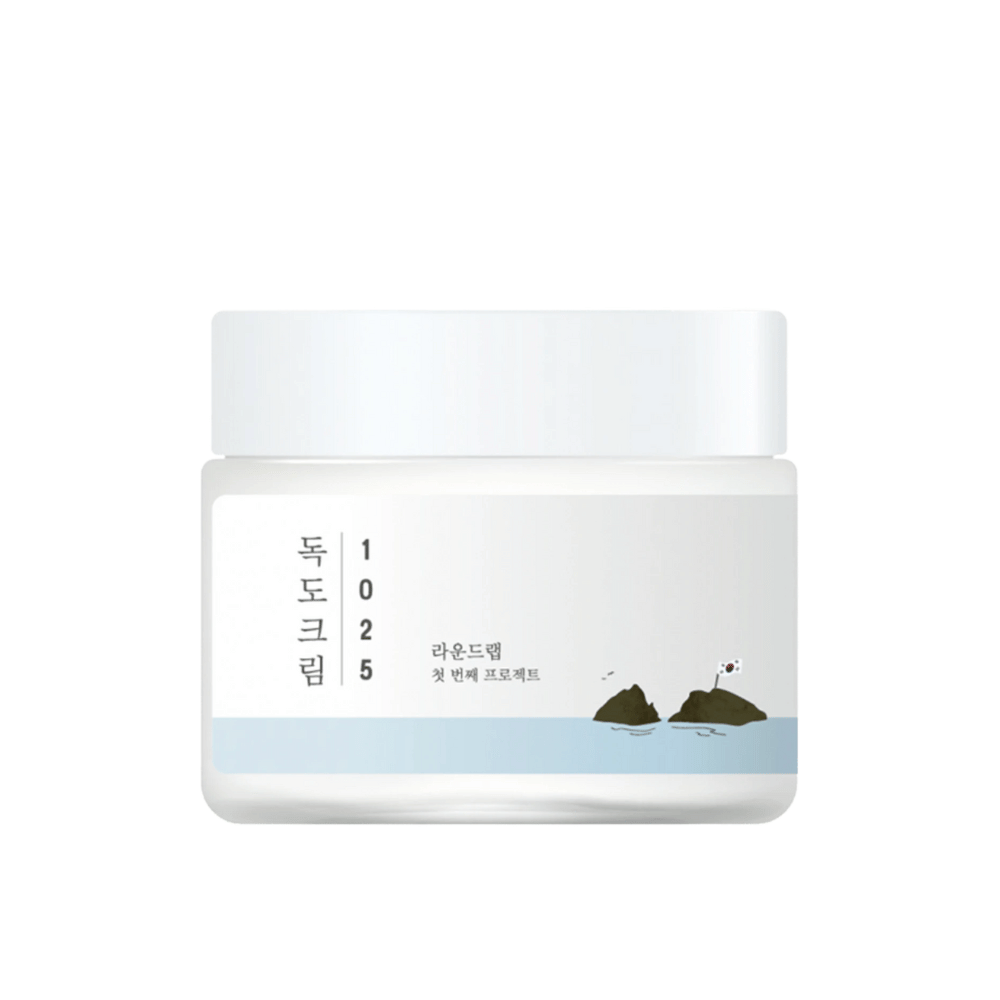 Un frasco con Round Lab 1025 Dokdo Cream 80ml para hidratación sobre fondo blanco.