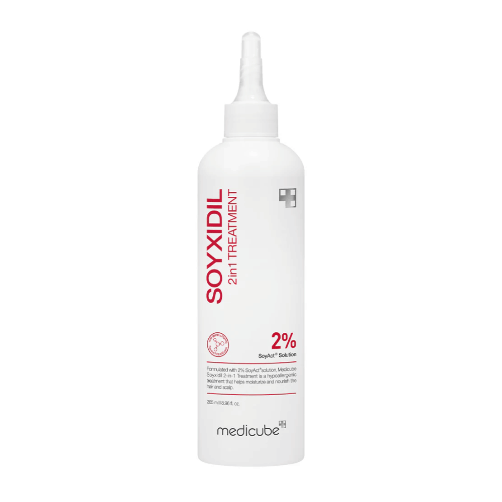 Imagen del producto de Medicube Soyxidil 2in1 Treatment en botella blanca con texto rojo. Contiene 2% de Solución SoyAct™ para fortalecer el cabello y el cuero cabelludo.