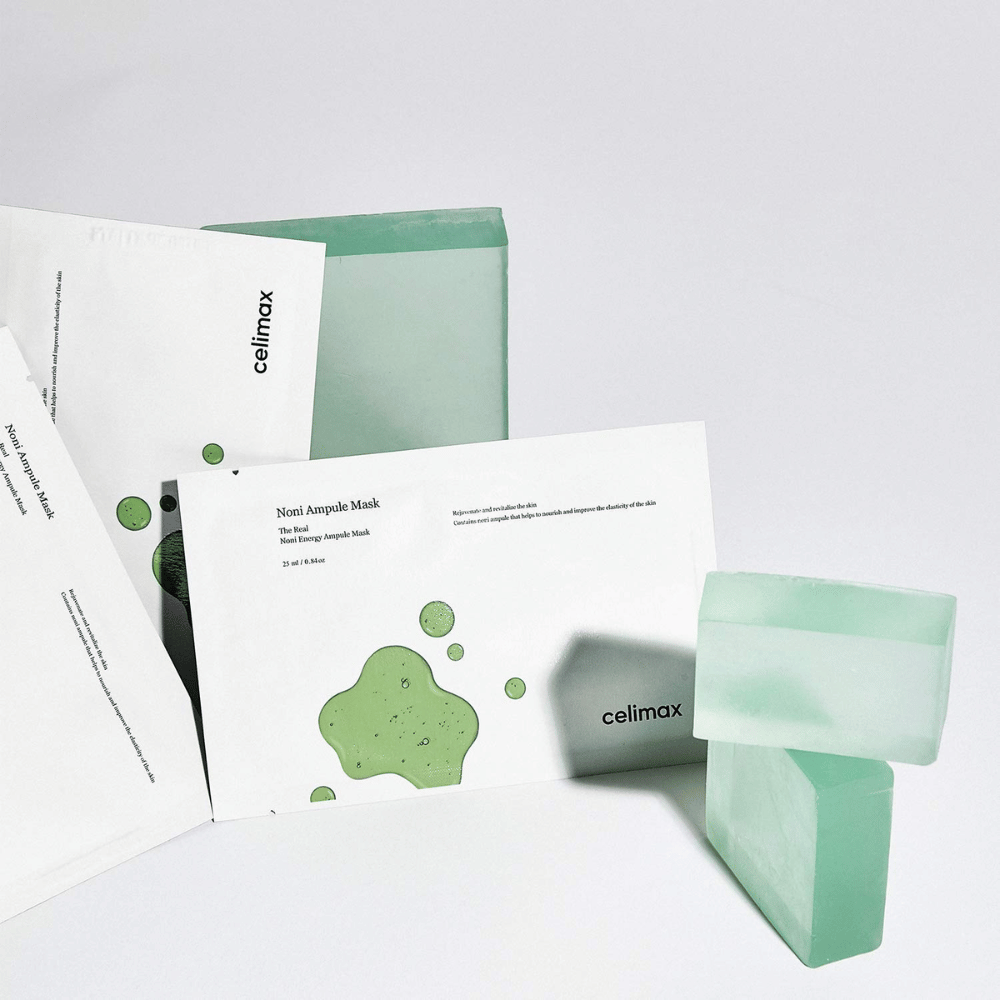 The Real Noni Energy Ampoule Mask de Celimax ofrece un tratamiento eficaz e hidratante para la piel. Con su fórmula única, ayuda a mejorar la estructura de la piel y a dar brillo. El color verde de las mascarillas y el diseño fresco transmiten una sensación de naturalidad y pureza.