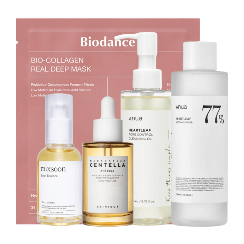 El conjunto "Tendencias K-Beauty Imprescindibles" contiene Anua Heartleaf Pore Control Cleansing Oil, Heartleaf 77% Soothing Toner, Skin1004 Madagascar Centella Ampoule, y Mixsoon Bean Essence junto con un Bio-Collagen Real Deep Mask de Biodance. Estos productos están cuidadosamente seleccionados para proporcionar una limpieza profunda, hidratación intensa y efectos calmantes para la piel, lo que los convierte en productos esenciales para una rutina de cuidado de la piel completa.