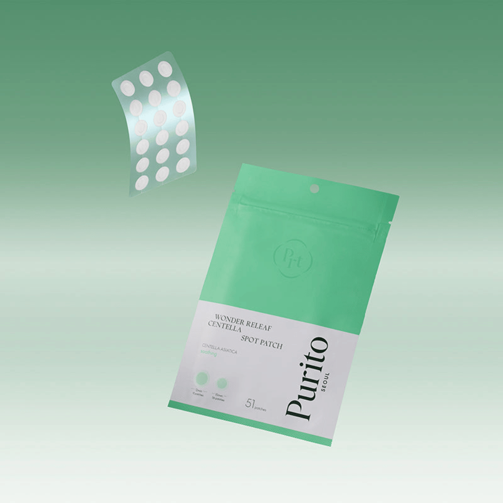Purito Wonder Releaf Centella Spot Patch con empaque y parches para acné transparentes, calmante spot treatment con centella asiatica para granos y piel irritada.