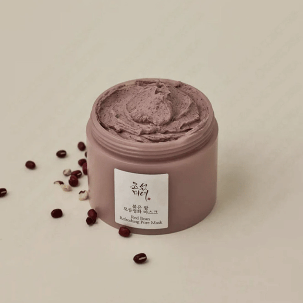 Un frasco Red Bean Refreshing Pore Mask 140ml de Beauty of Joseon con espinilla.