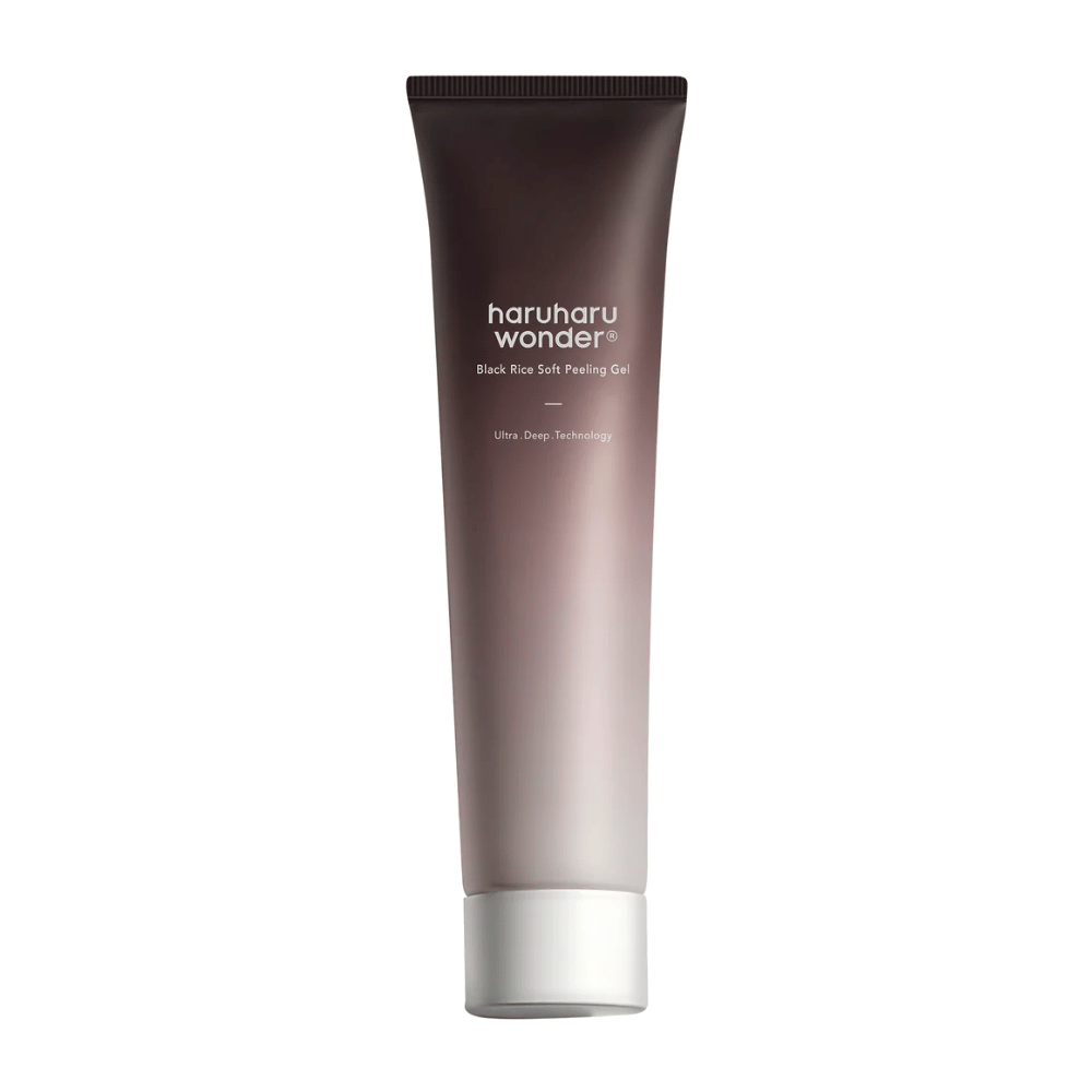 Un tubo Haruharu Wonder Black Rice Soft Peeling Gel 100ml con propiedades exfoliantes sobre un fondo blanco.